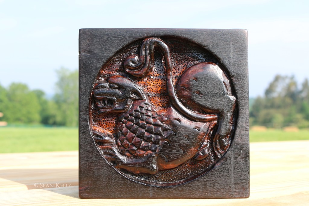 hear me roar lion heraldry gargoyle medieval wenge wood carving relief woodwork woodcarving traditional folk art crafts sean kelly odinns grove