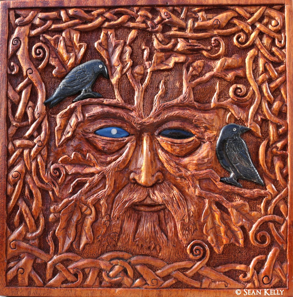 odinn odin woden wotan odinn's enlightenment odinns grove sean kelly pagan art folk art mythology rebirth initiation shamanism yggdrasil green man ravens huginn muninn norse viking germanic anglo saxon ancestor carving woodcarving knotwork urnes eye evil eye oak oak leaf beard treebeard relief
