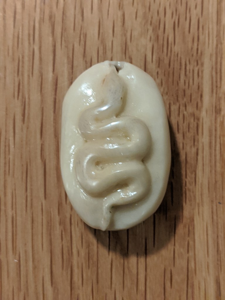 snake carving netsuke tagua nut vegetable ivory serpent sean kelly odinns grove
