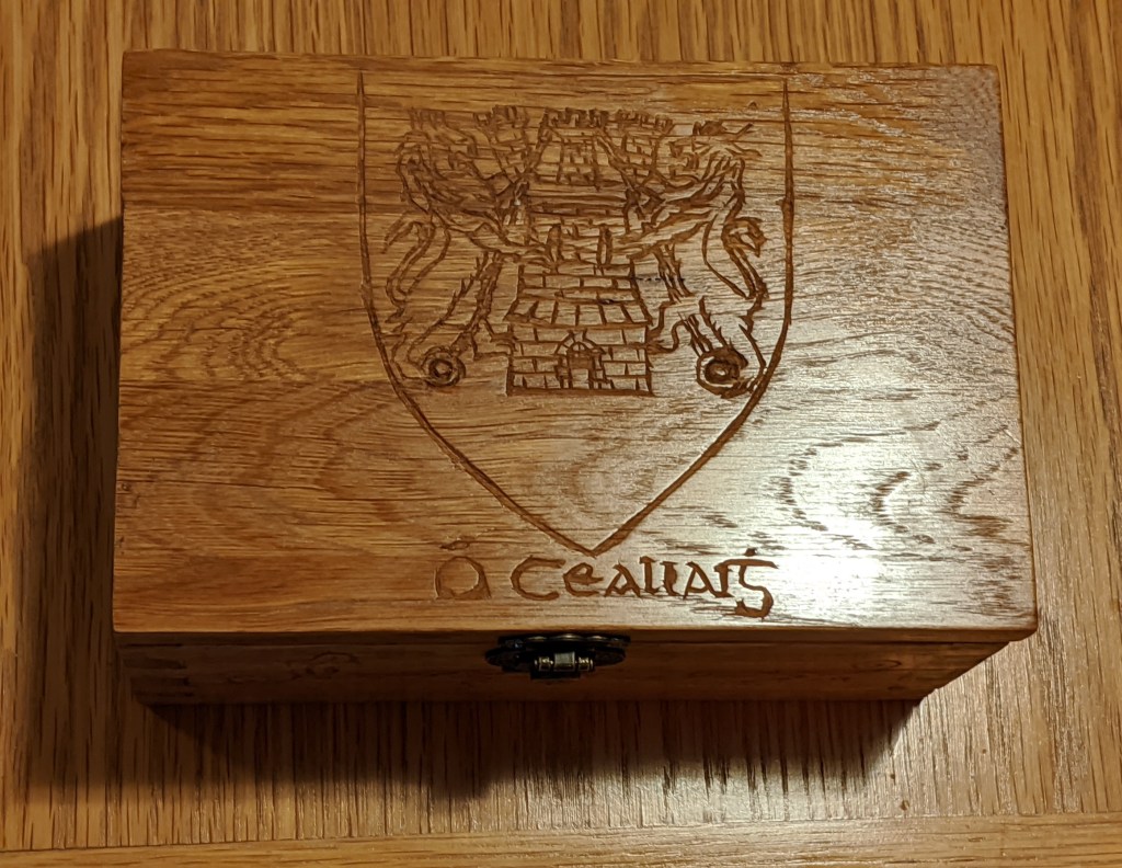 ceallaigh family crest heraldry ancestry engraving woodcarving relief carving boxmaking box dovetail joints woodwork sean kelly odinns grove traditional arts crafts